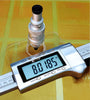 Beta Precision Digital Electronic Ruler. A digital electronic ruler with a microscope attachment displaying a measurement on its LCD screen. Non-contact measurement of large and small distances. 